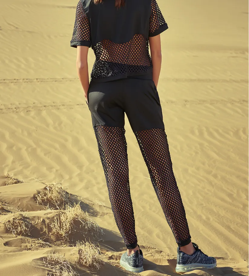 CAGGEEN CHAIN MESH PANEL TRACK PANTS IN BLACK