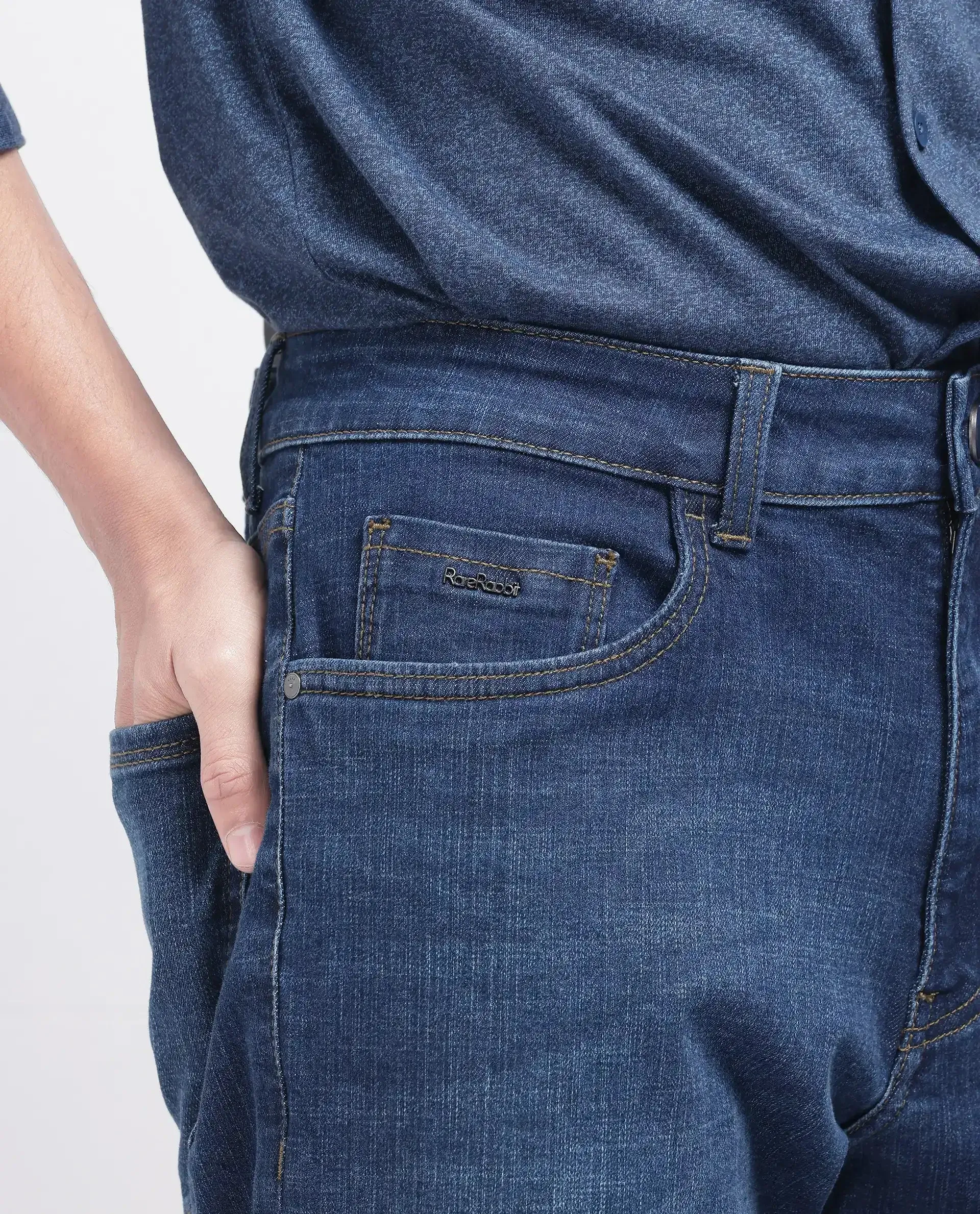 Rare Rabbit Men Axel Blue Cotton Blend Fabric Button And Zip Closure Plain Jeans