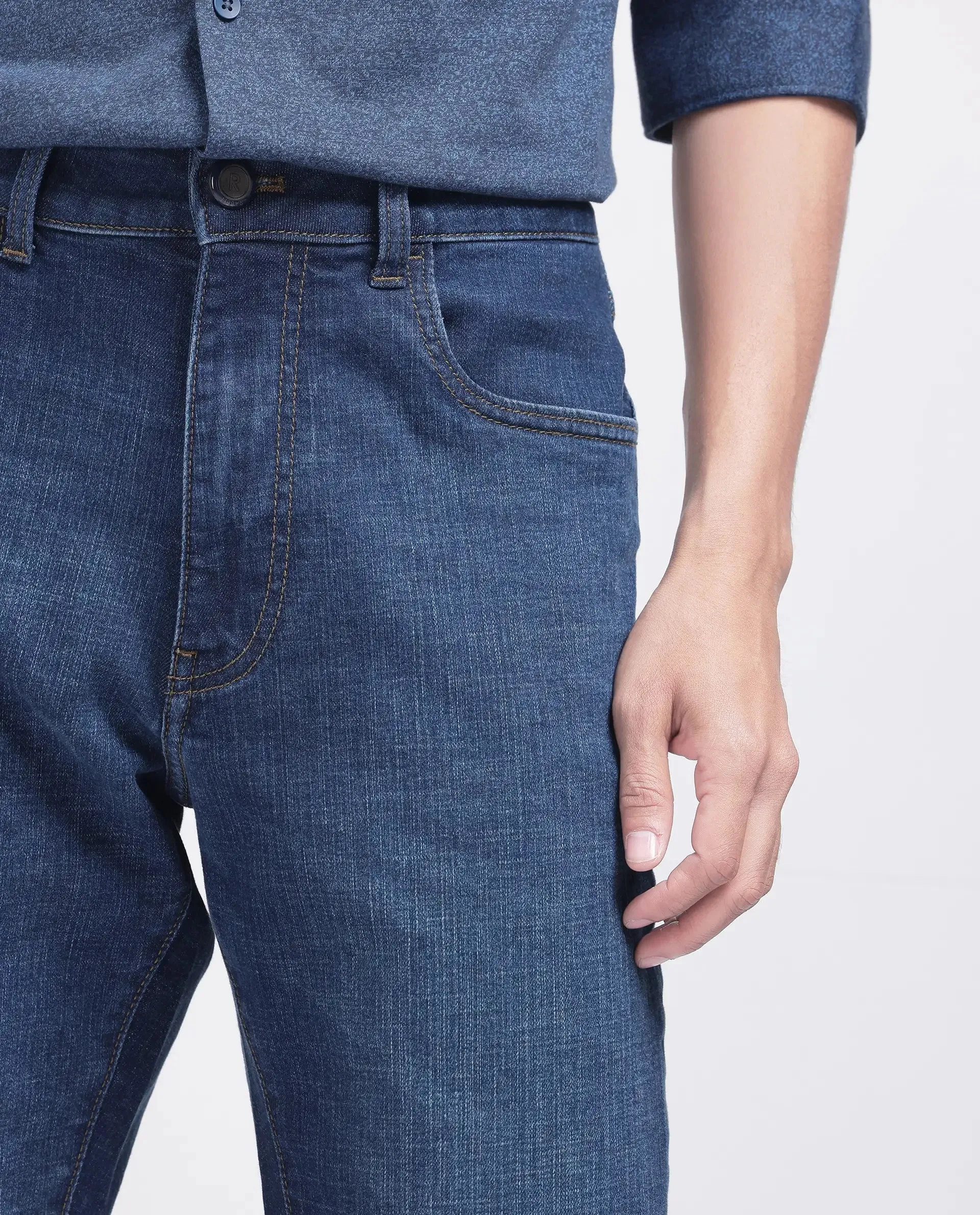Rare Rabbit Men Axel Blue Cotton Blend Fabric Button And Zip Closure Plain Jeans