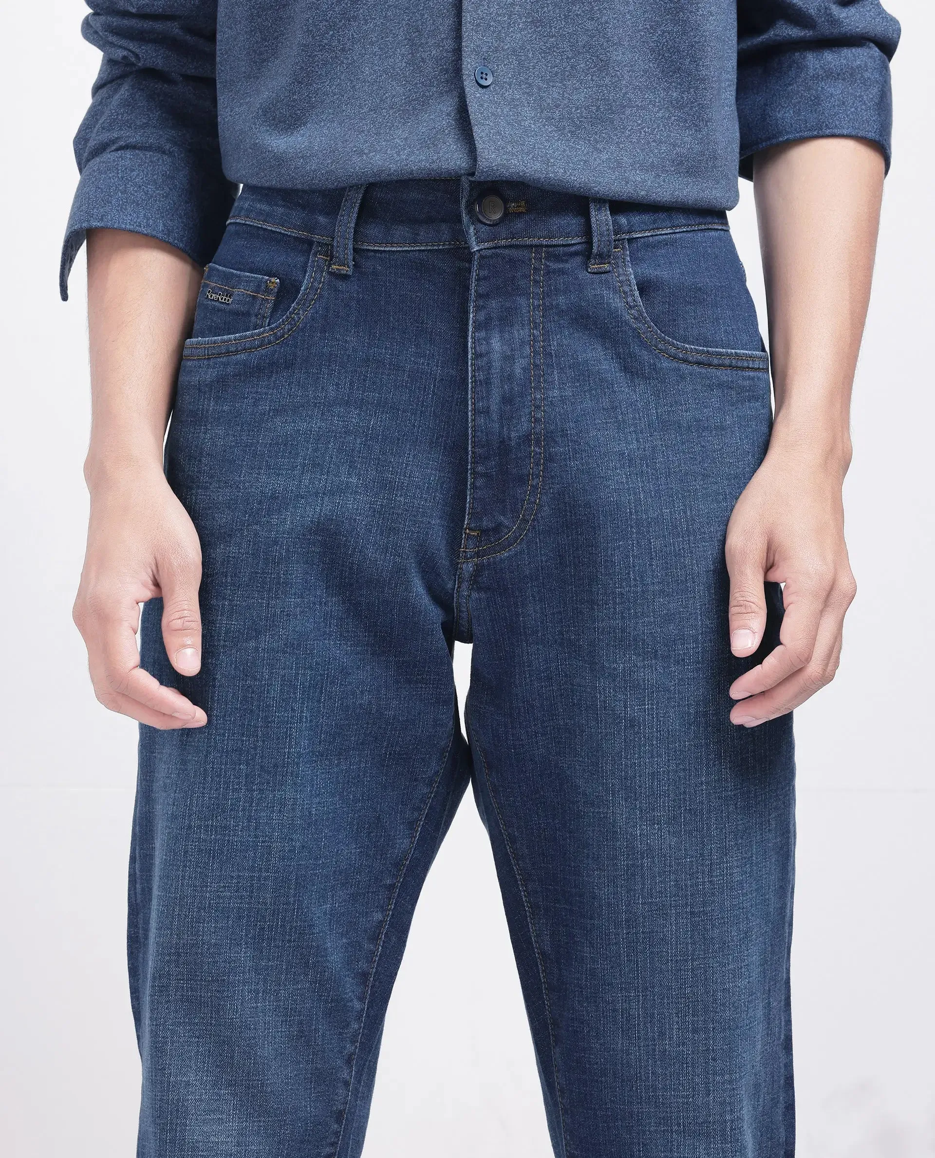 Rare Rabbit Men Axel Blue Cotton Blend Fabric Button And Zip Closure Plain Jeans