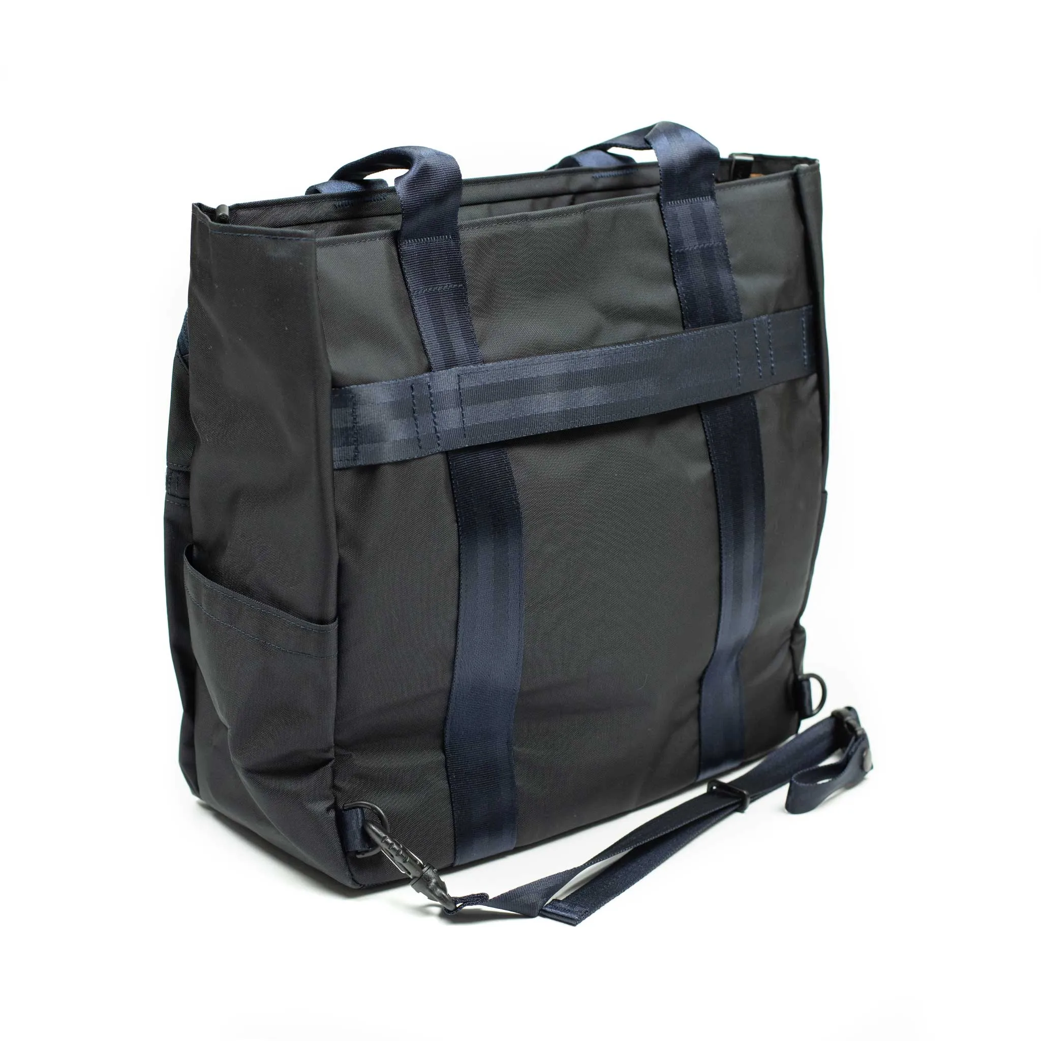 Various convertible tote in navy nylon with luggage strap (restock)